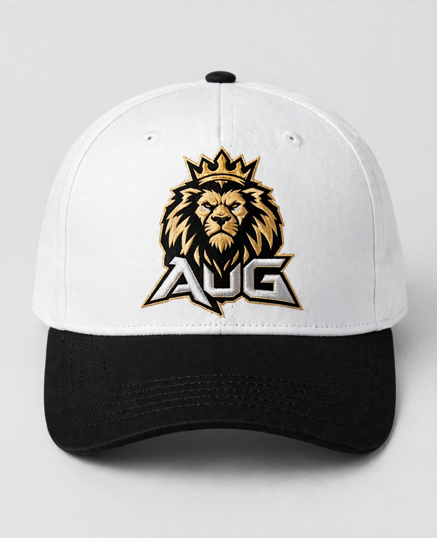 White and black Aug Fin_Est fitted hat with a detailed gold lion emblem