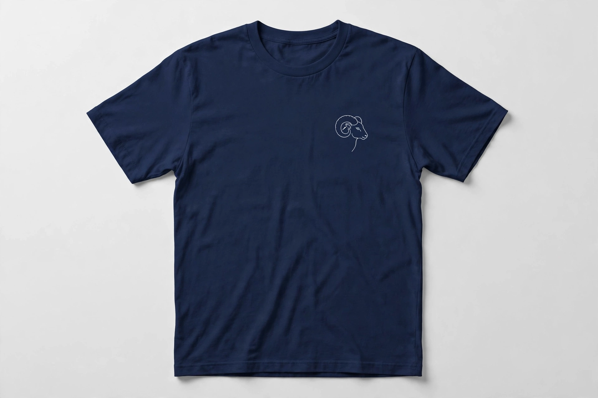 Navy T-shirt with a small white line-art ram emblem on the left chest