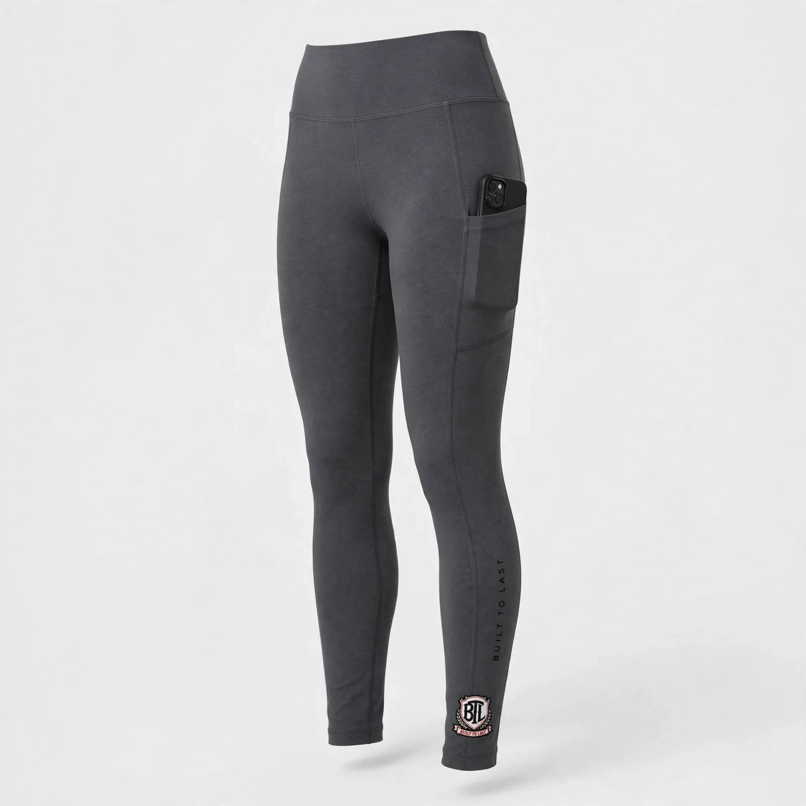 Charcoal Built to Last women’s leggings with ankle branding and side phone pocket