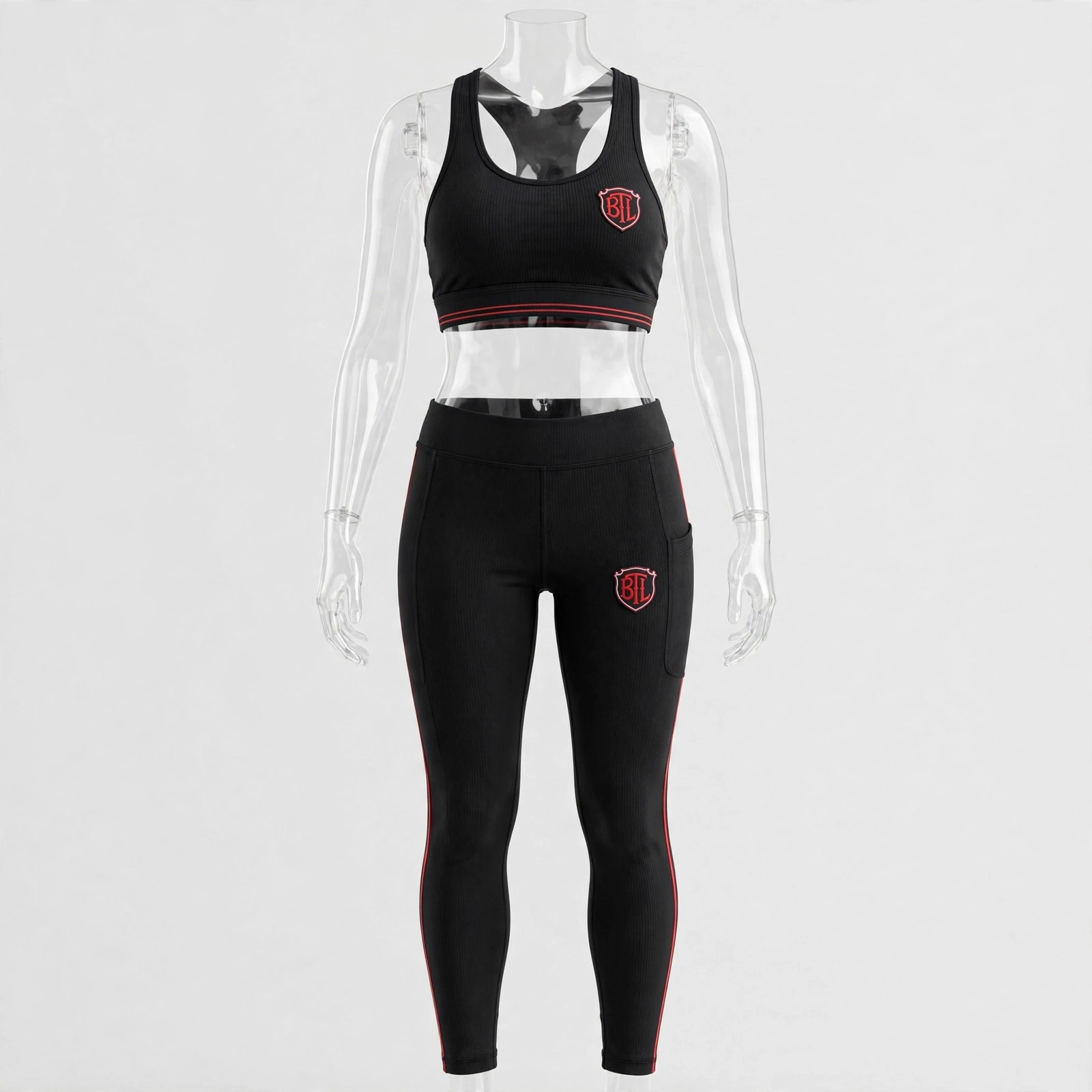 Black Built to Last women’s activewear set with matching sports top and phone-pocket leggings