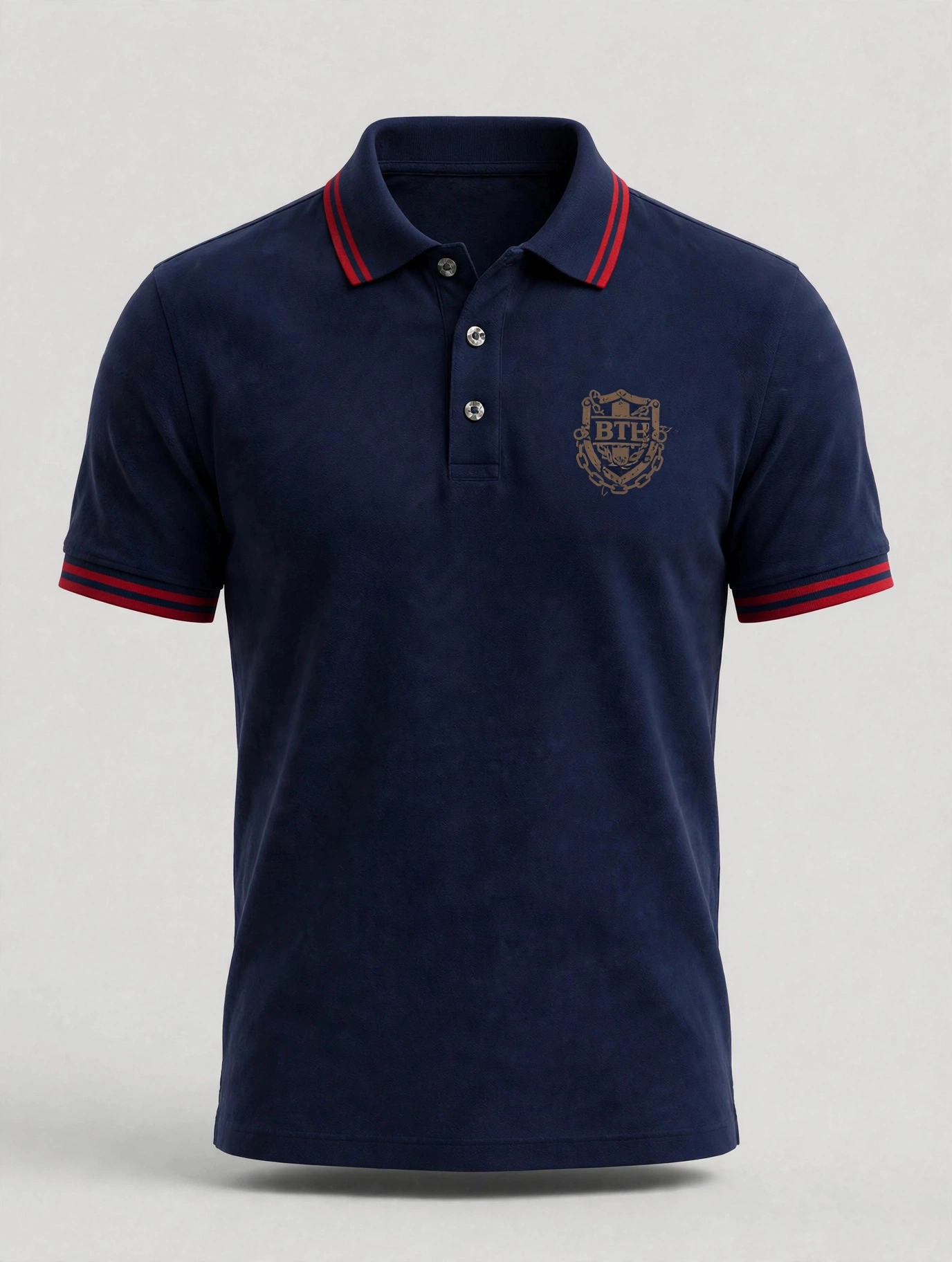 Navy men’s Built to Last polo with a small red and silver BTL shield and red collar tipping