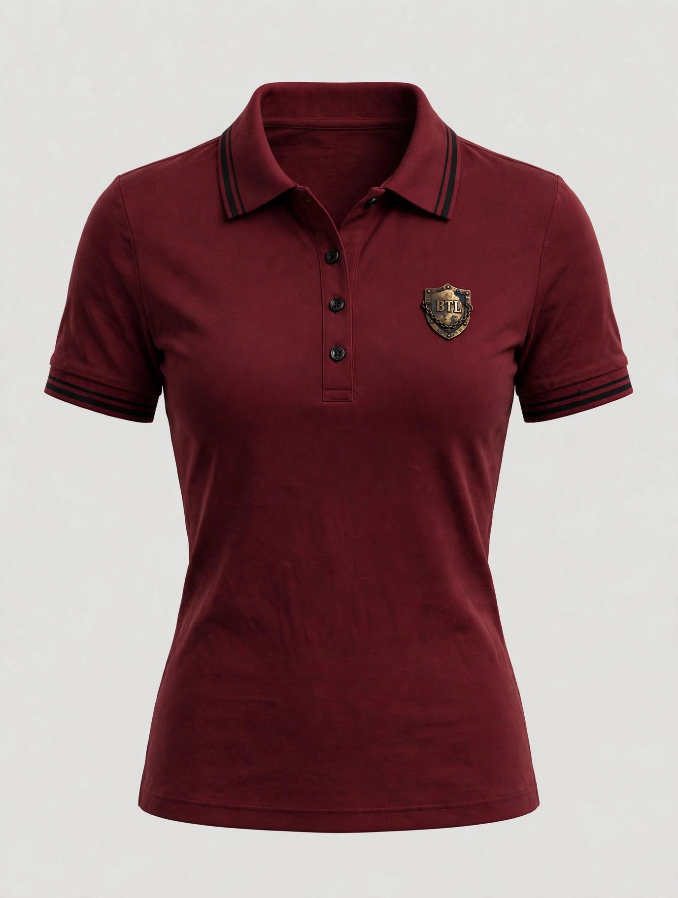 Maroon women’s Built to Last polo with a shield emblem