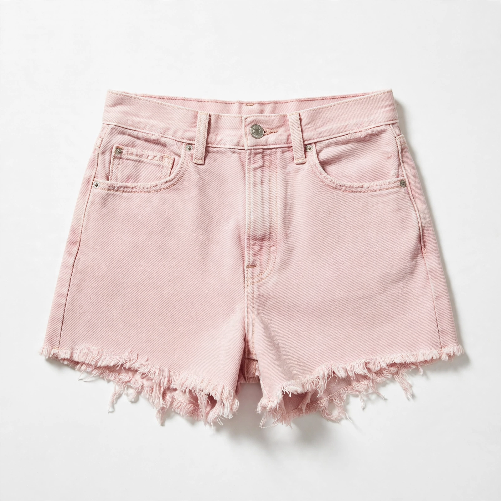 Front of pink cutoff denim daisy dukes laid flat