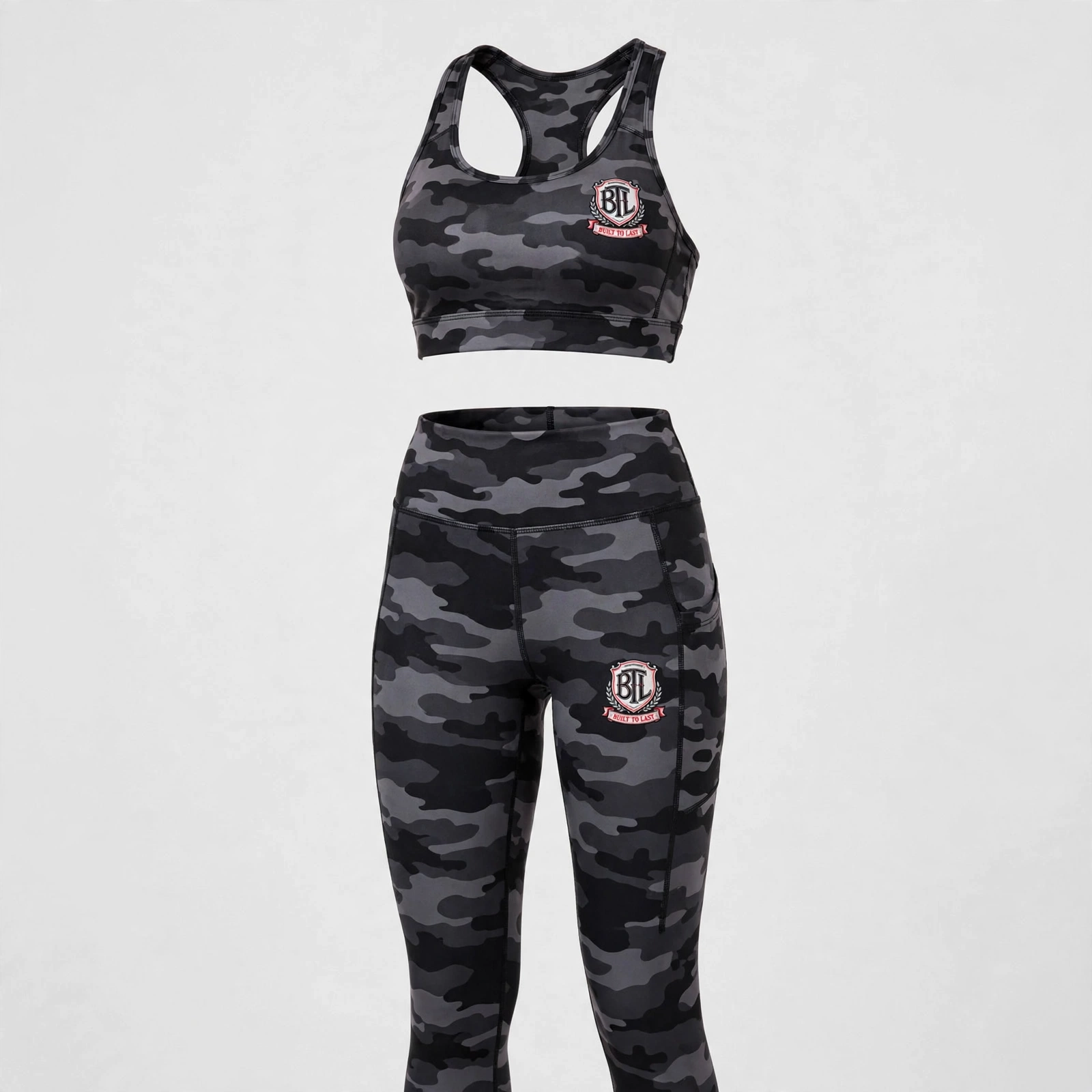 Black and gray camouflage Built to Last women’s activewear set with racerback top and phone-pocket leggings